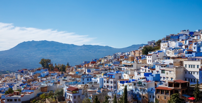 Sunny view of Chefchaouen Morocco's blue painted buildings