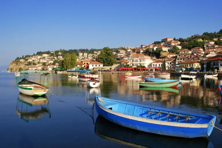 Fishing-boat-with-the-view-of-an-old-town-of-Ohrid.jpg