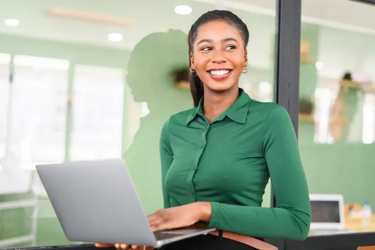 businesswoman-holding-laptop.jpg