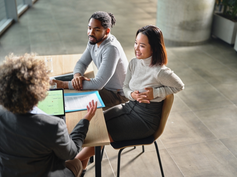 HR team members discussing work visa in the United Kingdom