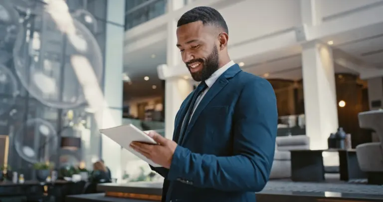 man-working-in-hotel-conference-lobby.jpg