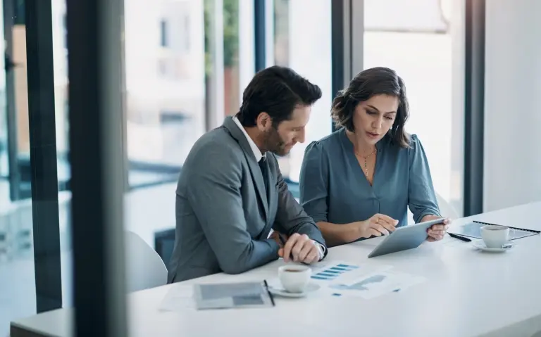 two-people-working-in-an-office.jpg