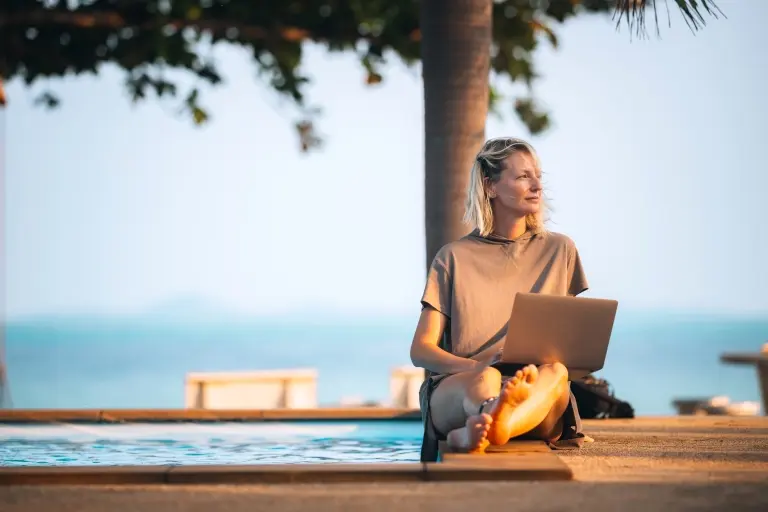 woman-works-remotely-by-the-pool.jpg