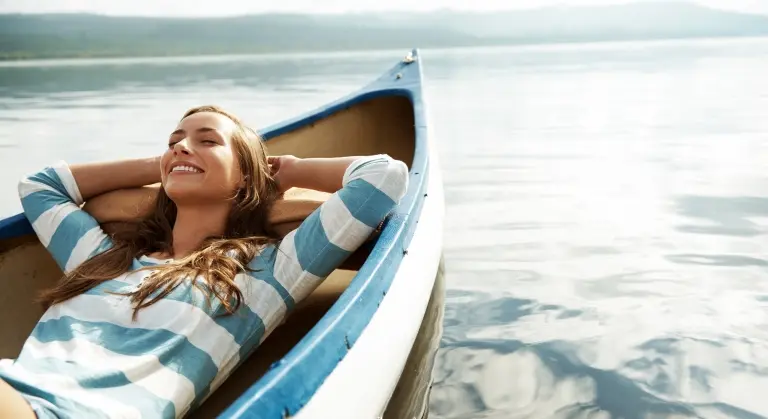 young-woman-relaxing-in-a-canoe.jpg
