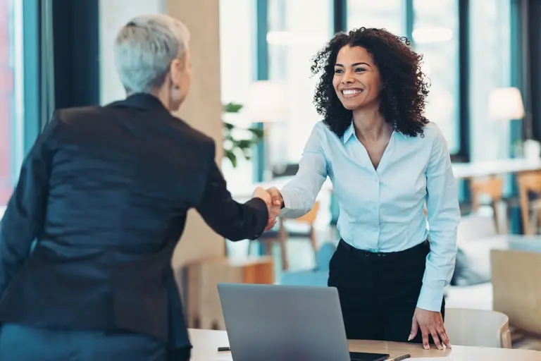 Businesswomen-shaking-hands-in-the-office.jpg