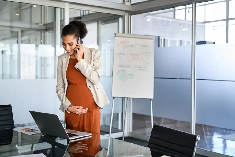 Pregnant-business-woman-working-in-office.jpg
