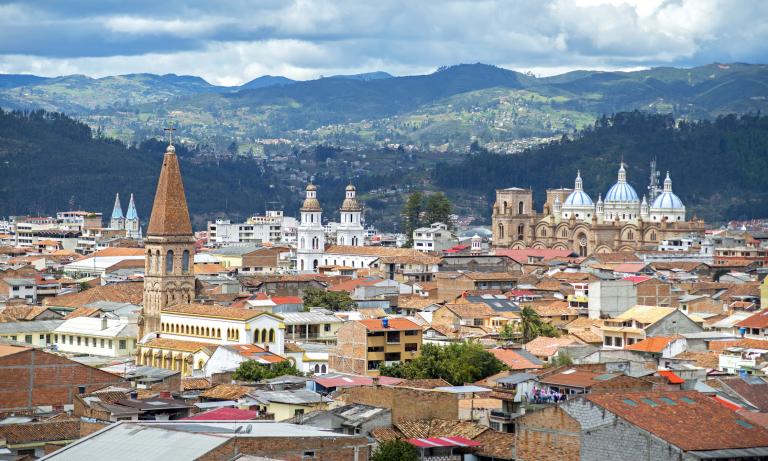 Aerial view of the rooftops and steeples of Cuenca in Ecuador