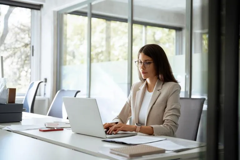 woman-using-computer-in-office.jpg