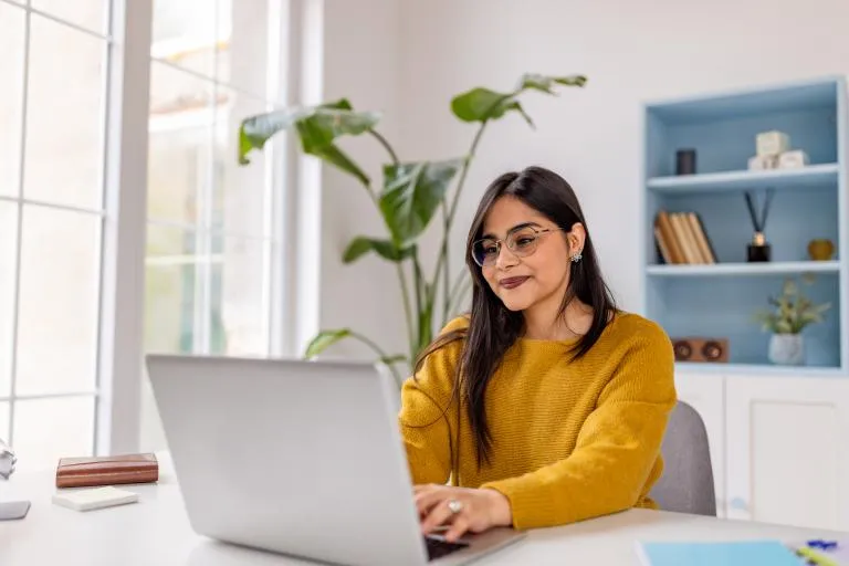 woman-working-on-laptop-in-calm-home-office.jpg
