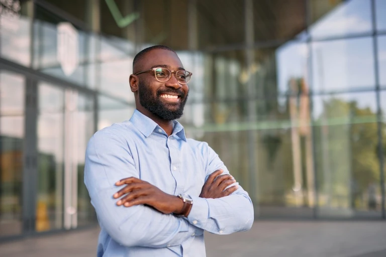 businessman-standing-with-arms-crossed.jpg