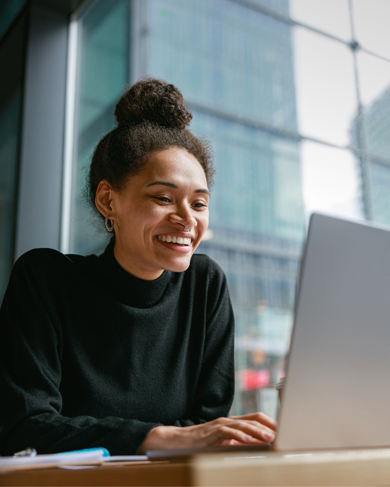 Woman smiling on a video call