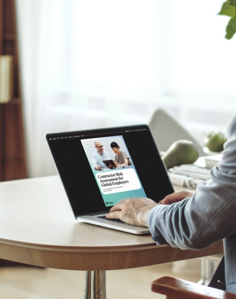 Person looking at Contractor Risk Assessment on their laptop.