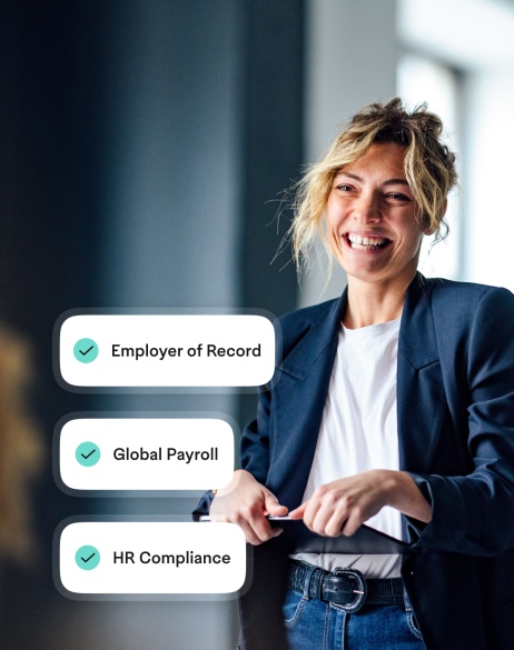 Woman holding a tablet with UI of employer of record, global payroll, and HR compliance layered on time.