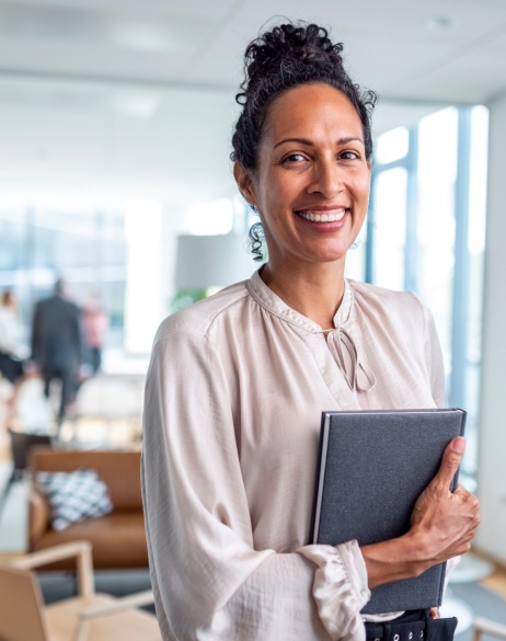 A new employee is being onboarded in a friendly office space