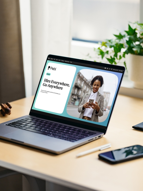 Hire Everywhere, Go Anywhere guide displayed on a laptop.