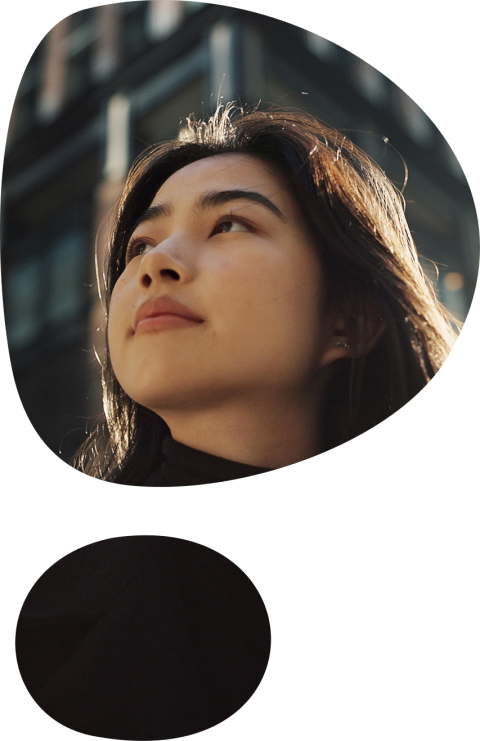 Professional woman in a city setting within the Pebl logo