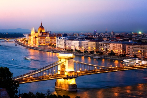Hungarian Parliament at dusk by the Danube in Hungary