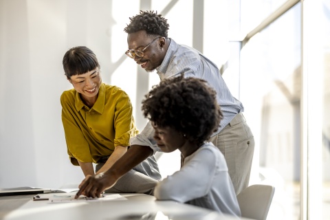 Global HR team discussing how to hire in Mozambique