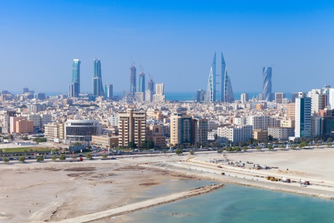 Aerial view of Manama’s skyline in Bahrain from the sea
