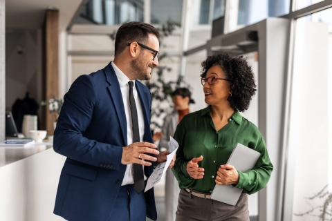 Business partners discussing salaries in American Samoa