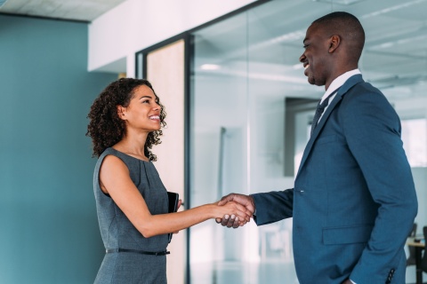 Employees meeting to discuss average salaries in Trinidad and Tobago