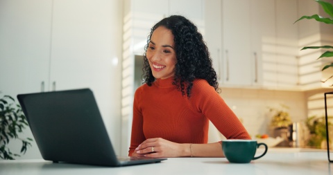 Smiling woman working from home in Ecuador