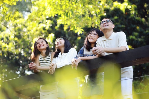 Family outside enjoying nature together during a public holiday in the Cayman Islands