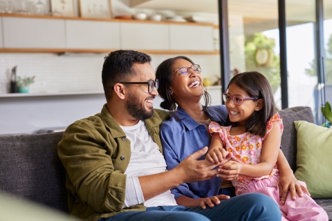 Family at home laughing and enjoying a Filipino public holiday