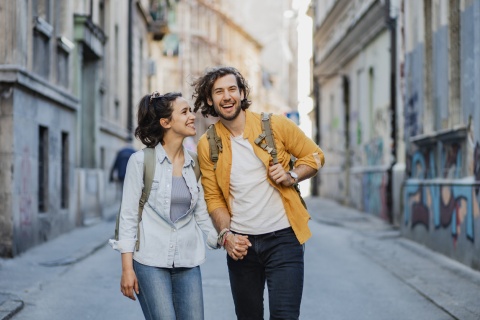 Couple walking down a street enjoying Armenia’s public holidays