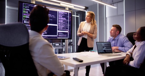 Global HR team discussing how to outsource prompt engineers