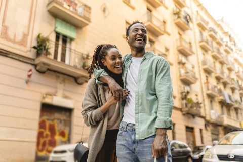 Smiling couple in a street enjoying Nigeria’s public holidays