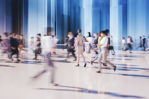 People walking on busy spot, going into different directions