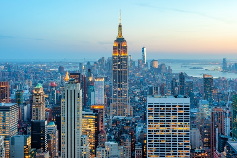 NYC skyline at dusk, representing the growth of scaling a business.