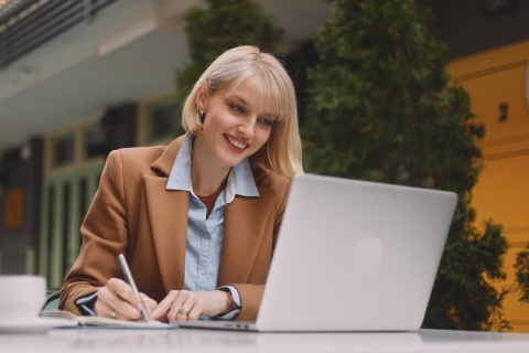Woman smiling with laptop